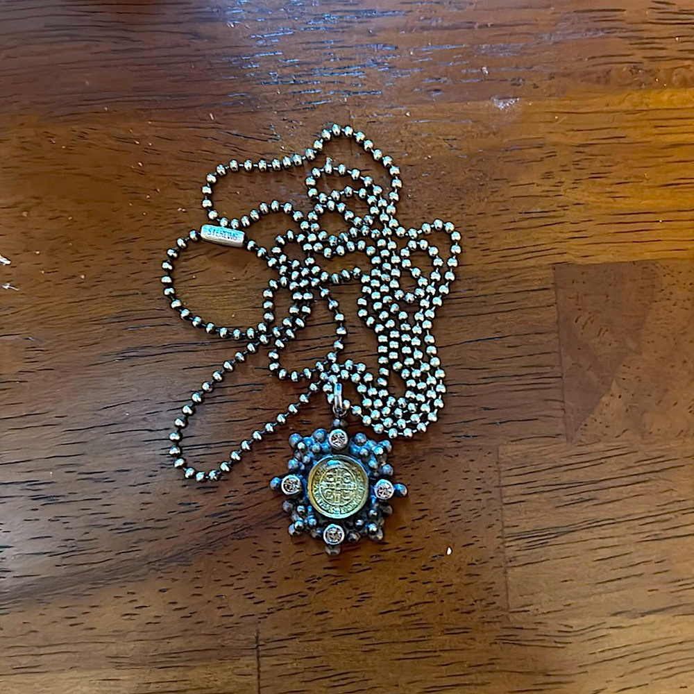 Virgin Saints and Angels San Benito necklace.